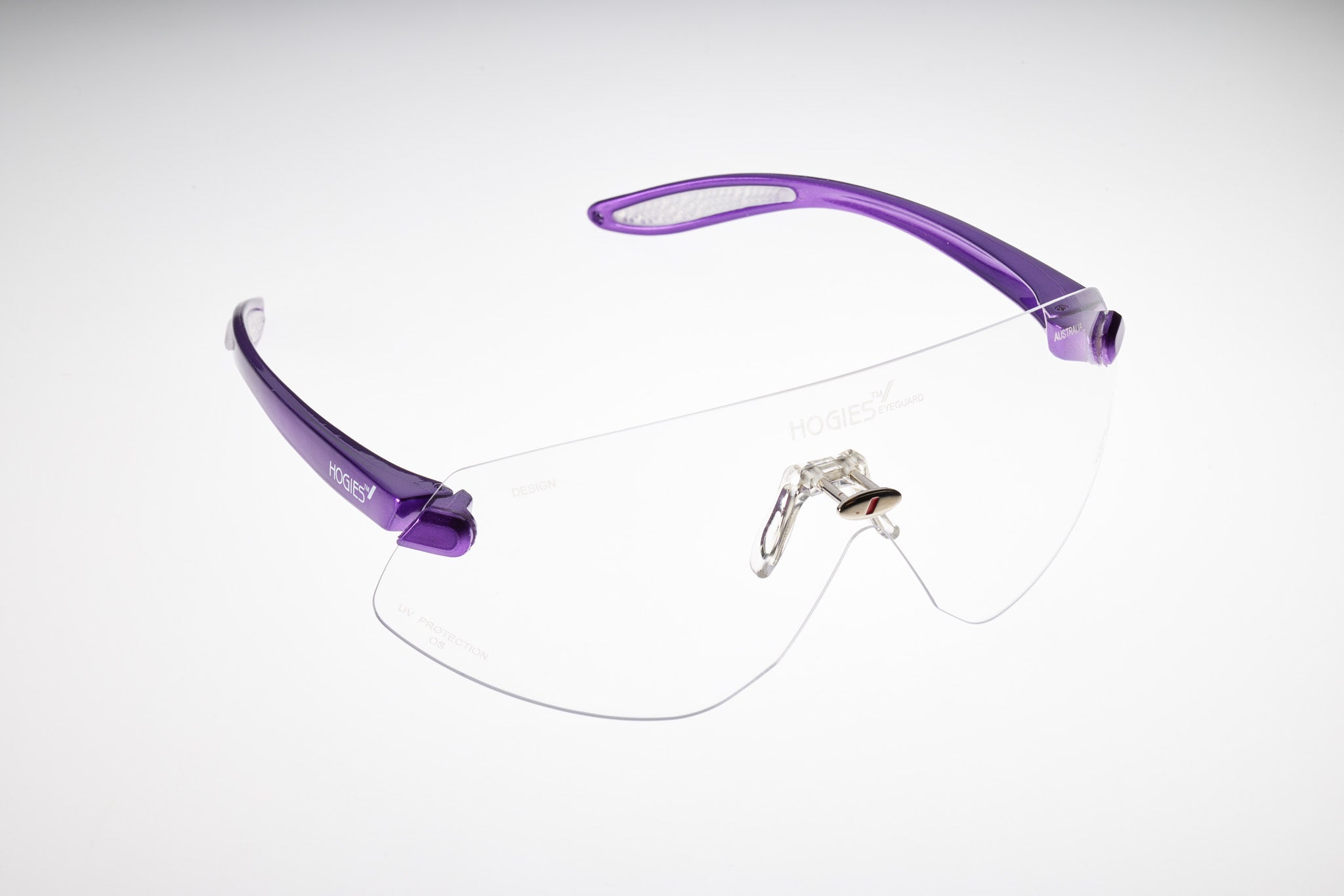 Purple safety goggles on a white background